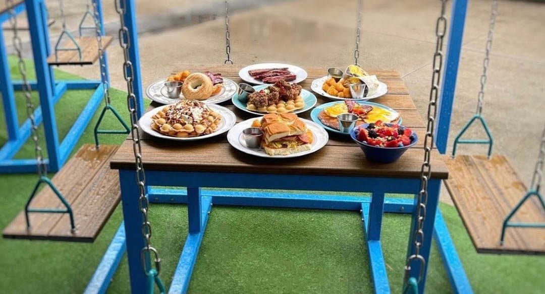 Wake ‘N Bacon: Blue Patio Installation - SwingTables