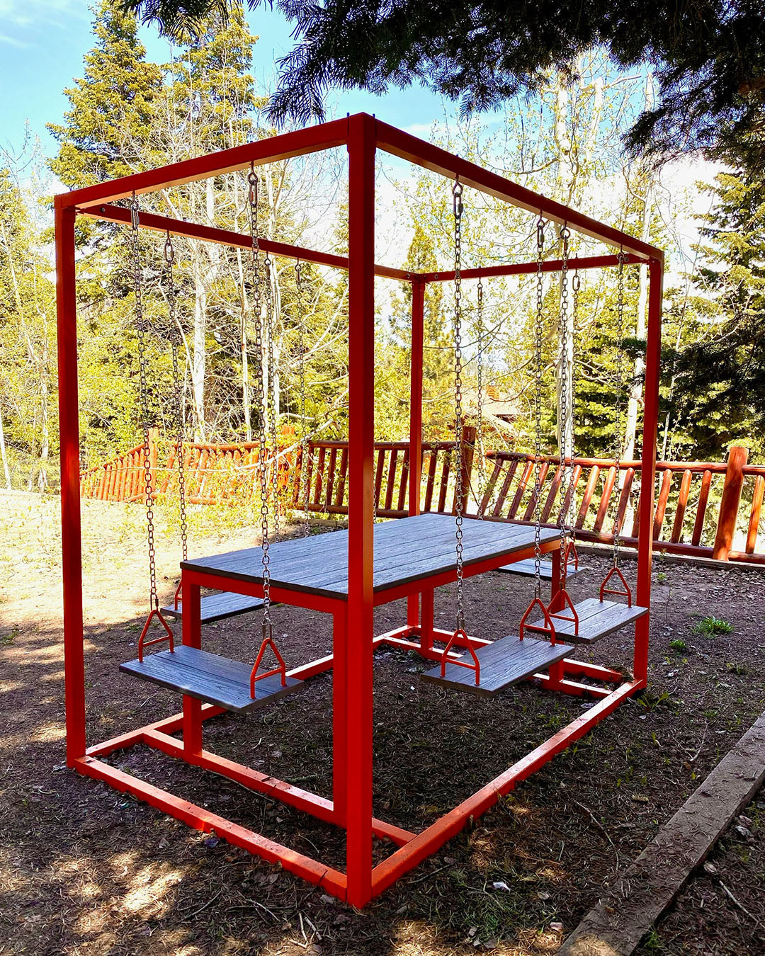 Red metal swing table outdoor